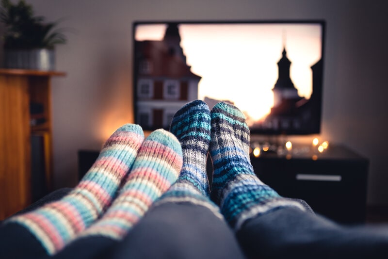 Image of fuzzy socks in front of tv